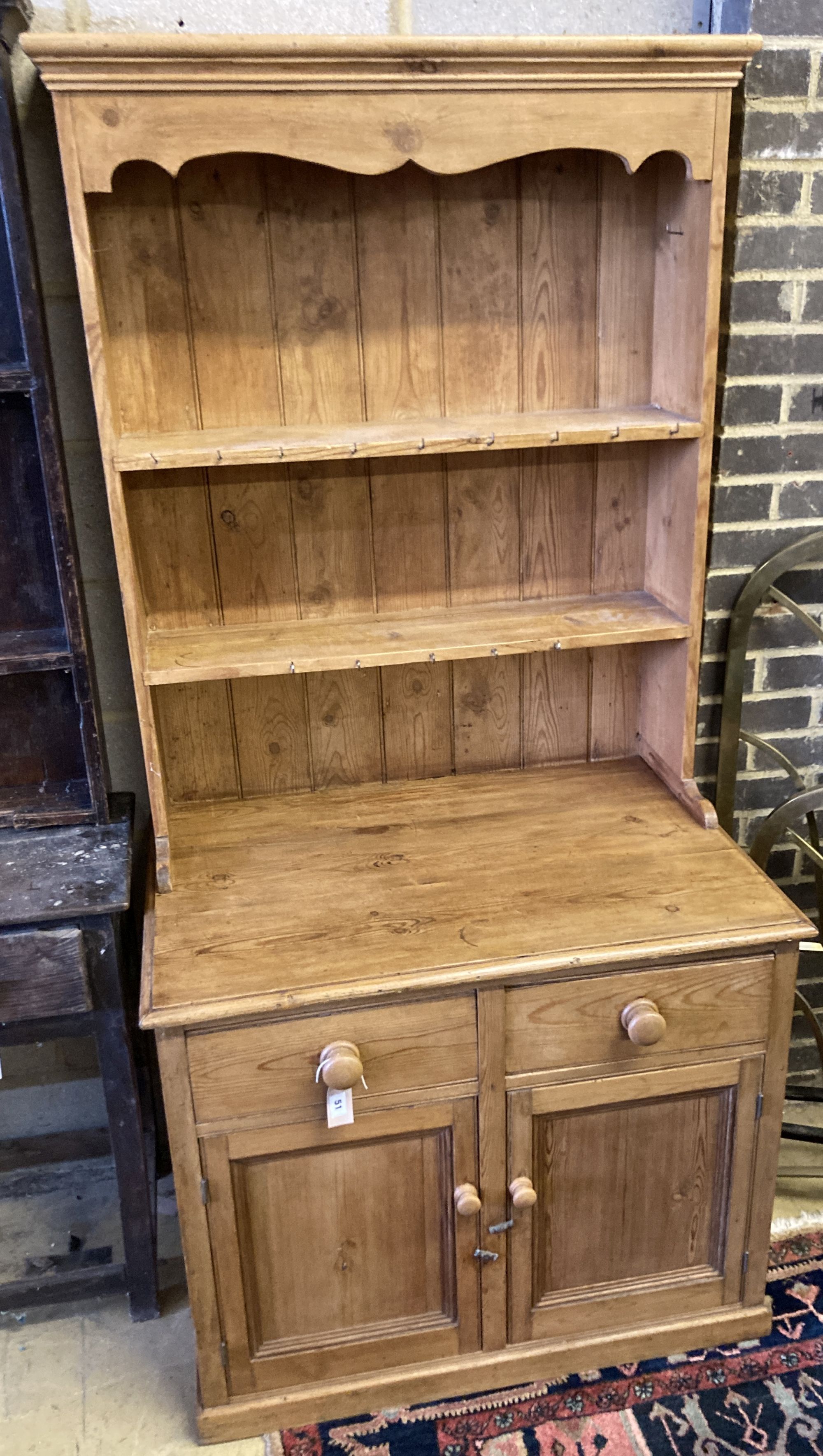 A small Victorian style pine dresser, length 92cm, depth 62cm, height 190cm